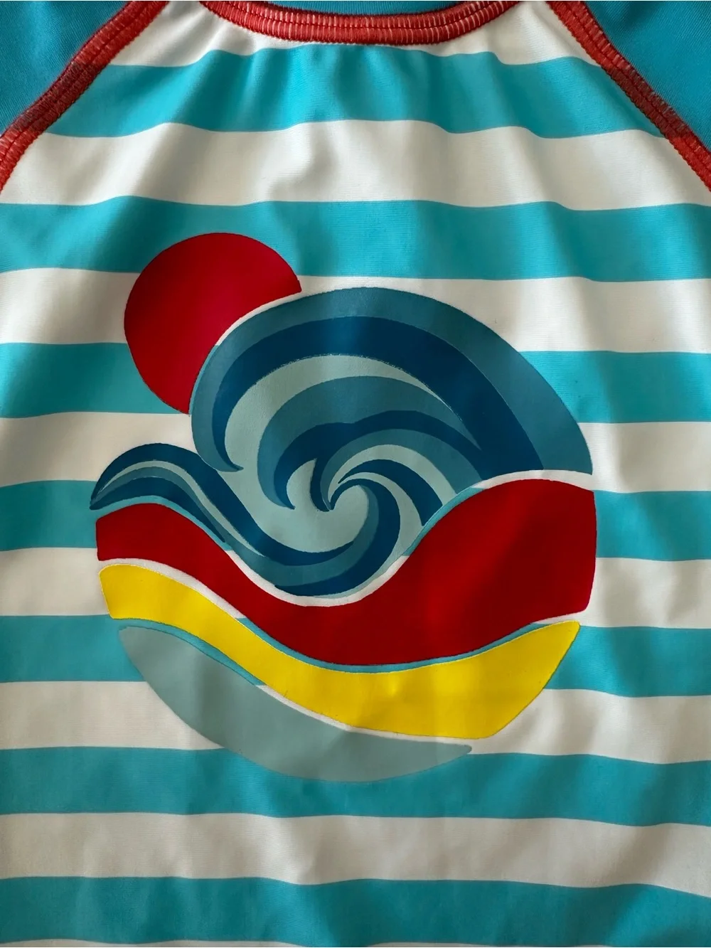 Turquoise Stripe Kids Swim Romper with Wave Graphic